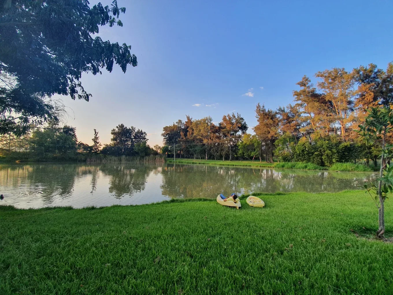 Private lake and green landscape at Hacienda Labor de Rivera